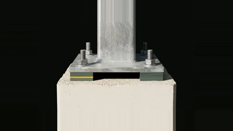 Galvanised steel base plate on a concrete pier, anchor bolts and shims, empty grout gap beneath, on black