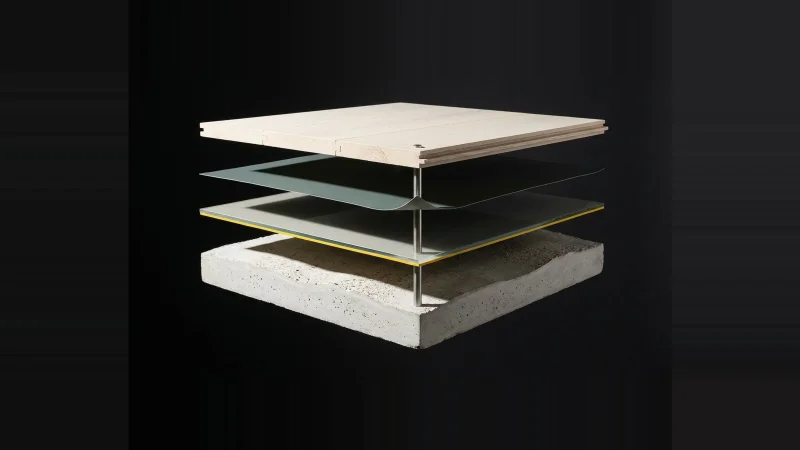 Exploded four-layer floor assembly floating apart, with one empty gap between slab and underlayment marked in yellow