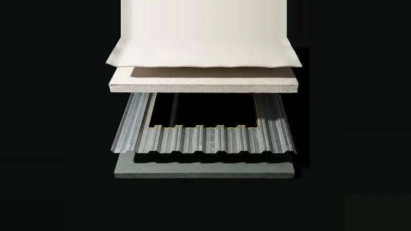 Overhead view of an exploded roof assembly model with one layer missing, marked by a thin yellow outline.